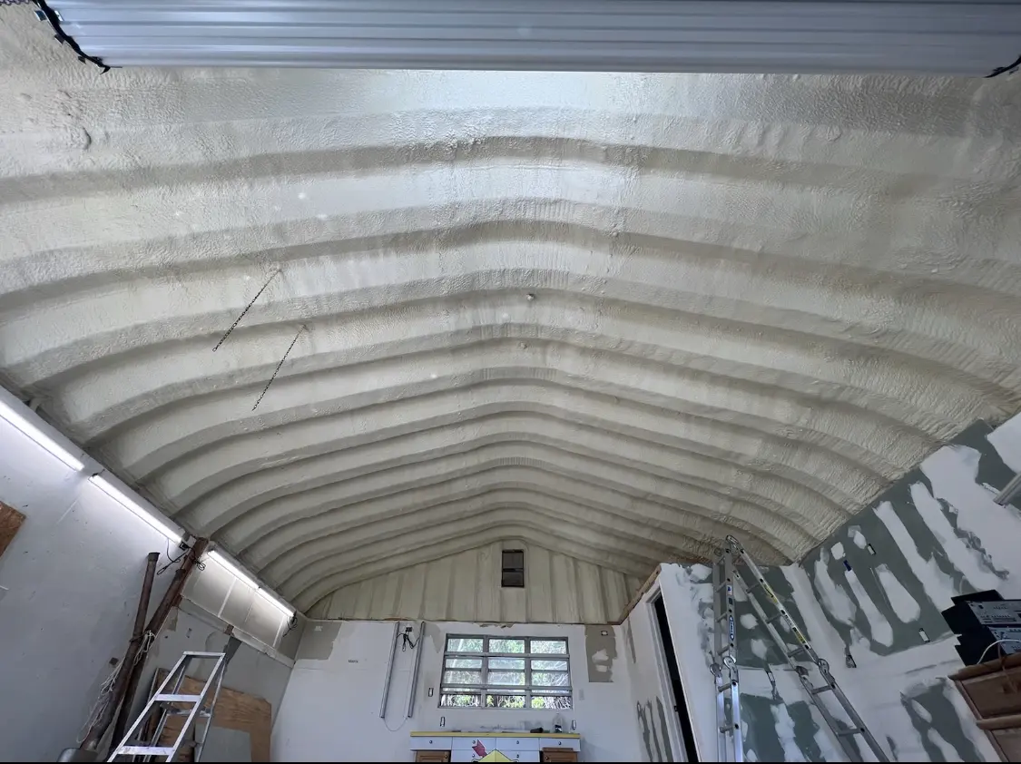 Spray polyurethane foam applied to the underside of a metal roof deck in Whitemarsh